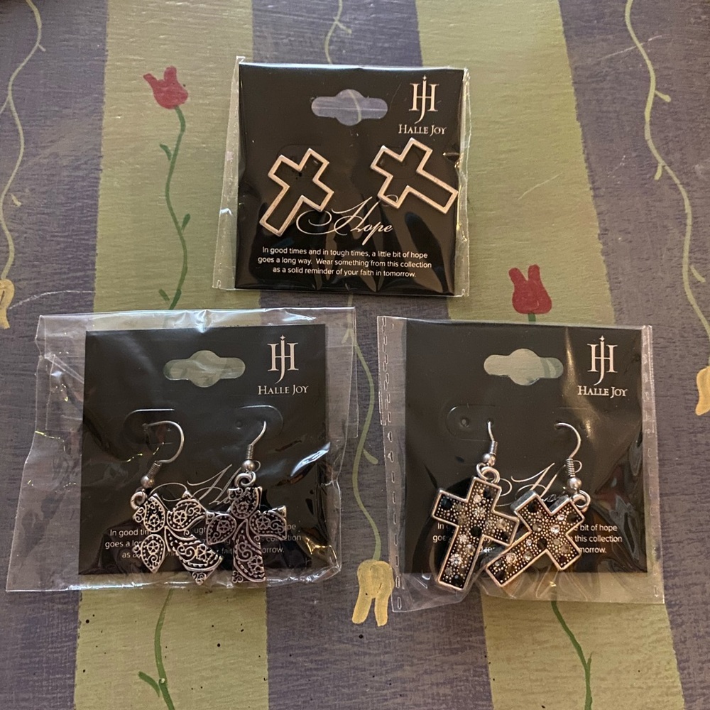 Set of three Halle Joy cross earrings.